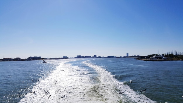 Scenic view of sea against clear blue sky