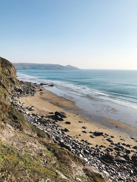 Photo scenic view of sea against clear sky