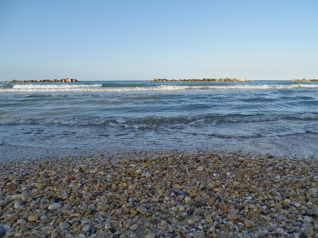 Photo scenic view of sea against clear sky