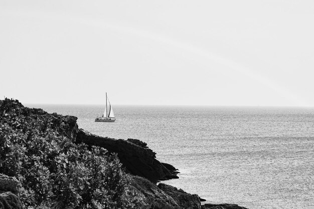 Photo scenic view of sea against clear sky