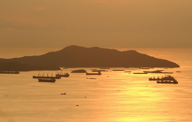 Scenic view of sea against orange sky