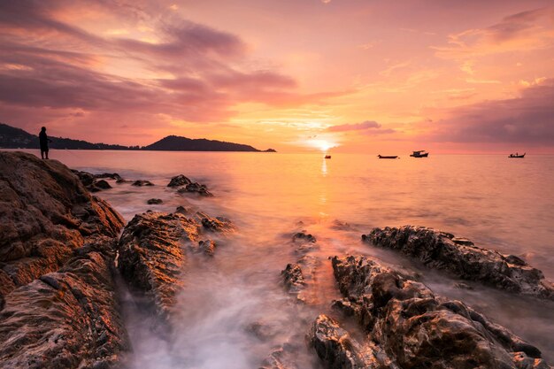 Scenic view of sea against sky during sunset