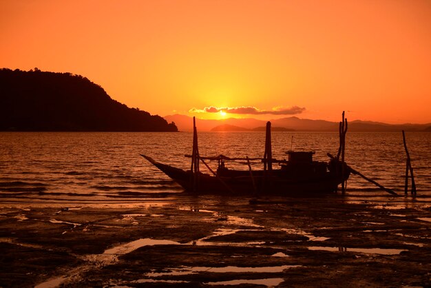 Scenic view of sea at sunset