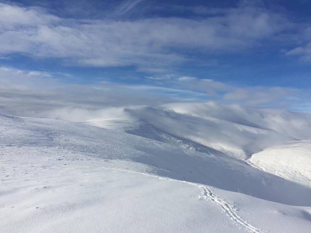 Scenic view of snow against sky