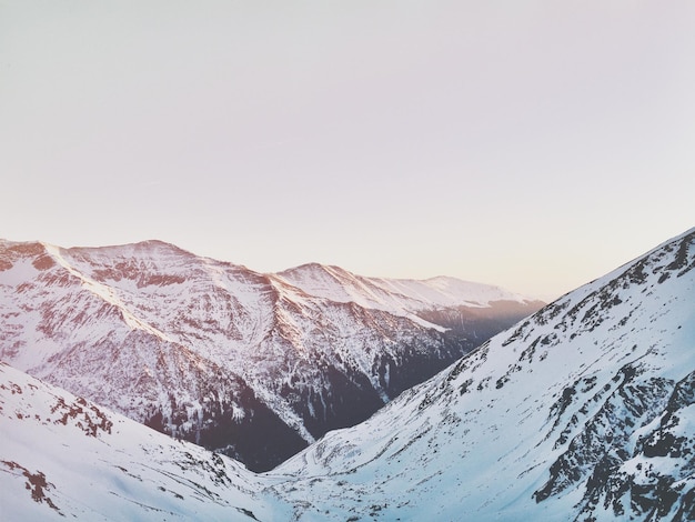 Scenic view of snow covered mountains