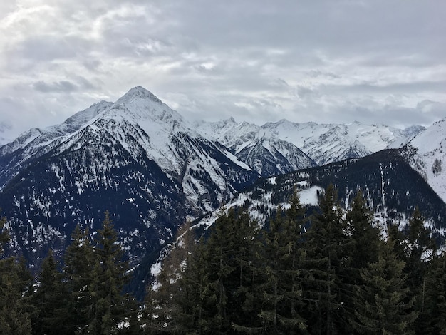 Scenic view of snowcapped mountains against sky