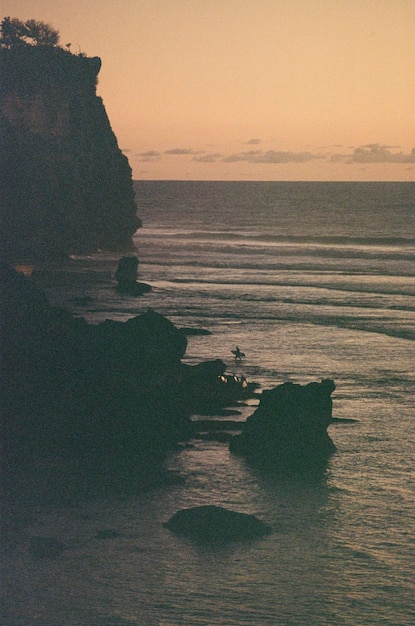 Scenic view of sunset in uluwatu bali indonesia shot on 35mm kodak film