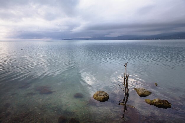 Scenic view of Trasimeno Lake in Umbria, Italy on a cloudy day