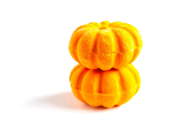 Scented orange bath bombs in the shape of a pumpkin Skin care products