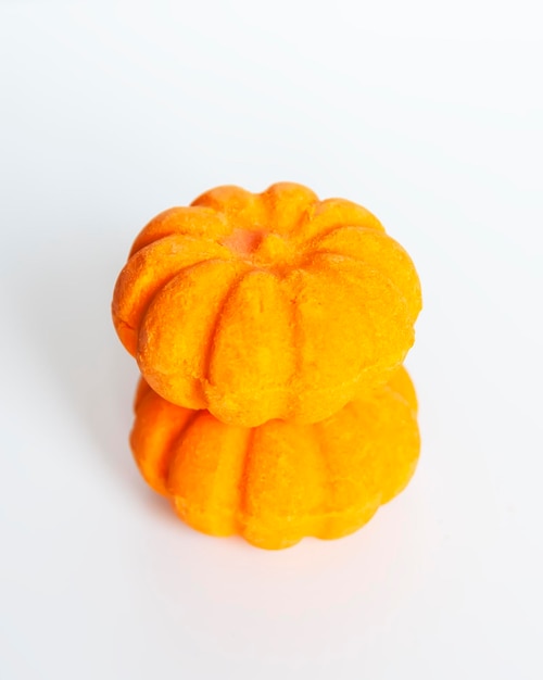 Scented orange bath bombs in the shape of a pumpkin Skin care products