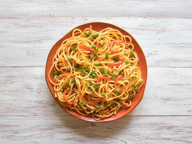 Schezwan Noodles with vegetables in a plate