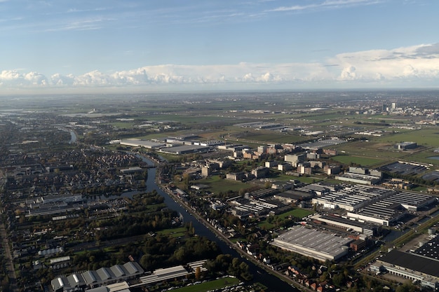 Schiphol airport amsterdam building and operation area aerial view after take off