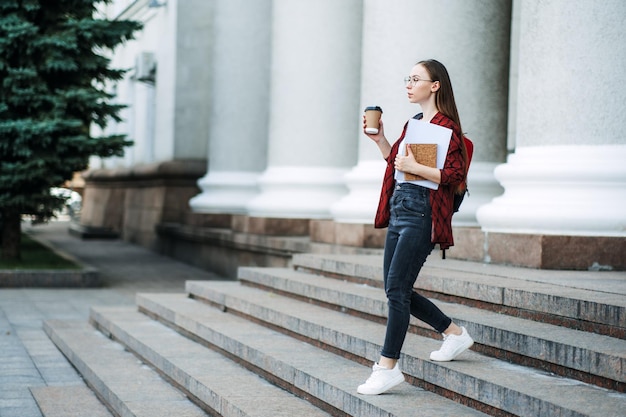 Scholarships grants for college students happy college student girl with laptop and books near