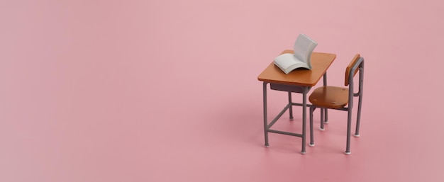 School desk with books on pink background