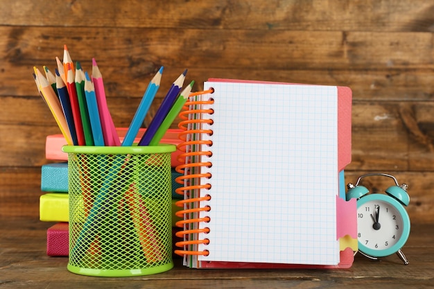 School equipment on wooden background