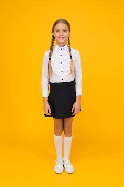 School girl wear uniform pretty little girl ready to study back to school education online while quarantine learning well ring successful future knowledge day childhood development