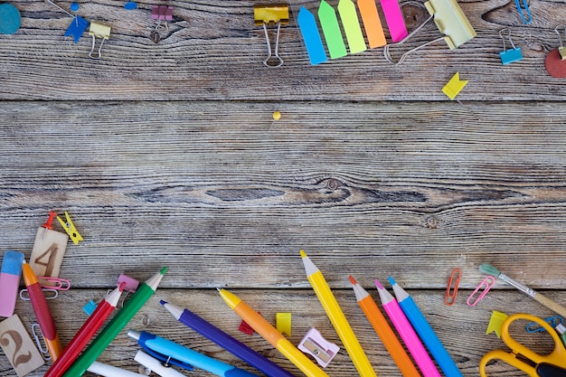 School items on wooden boards