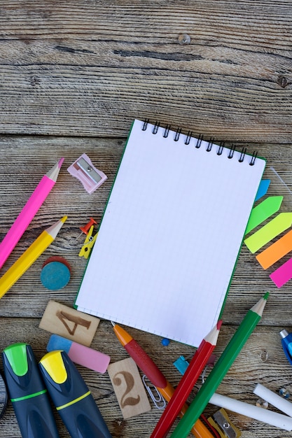 School items on wooden boards