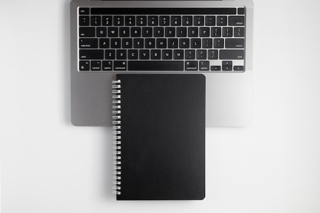 School notebook on a white background, spiral notepad on a table. flatlay