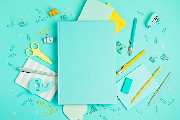 School and office supplies on pastel background