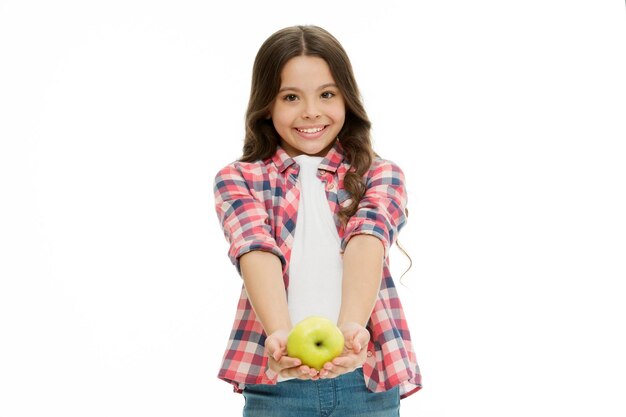 School snack concept Apple vitamin snack Girl cute long curly hair holds apple fruit white background Child girl casual clothes holds apple Child kid happy face like apple Healthy nutrition diet