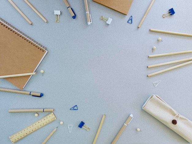 school stationery is laid out on a gray background