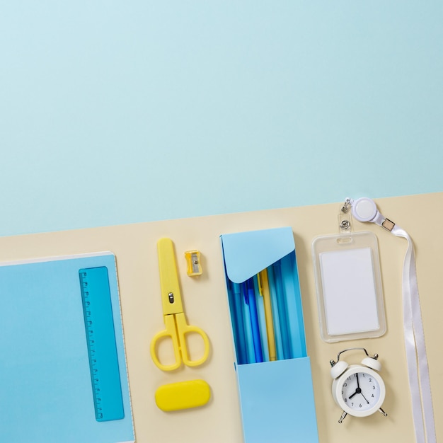 School stationery in yellow and blue tone Office accessories study and educational flat lay