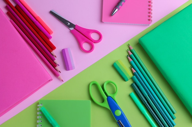 school supplies are selected in a color scheme on  multi-colored backgrounds