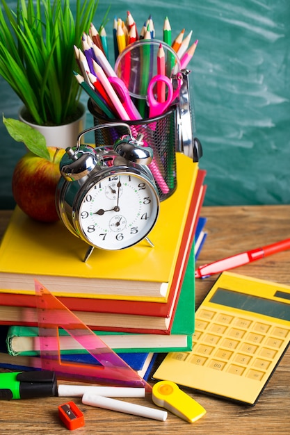 School supplies on the background of the school board