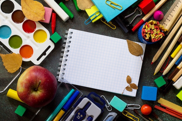 School supplies on a black table