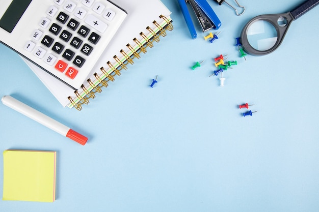 School supplies on the blue table