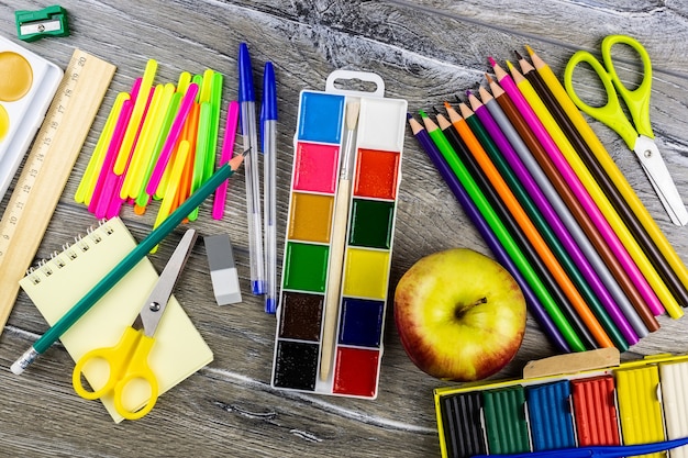 School supplies on a grey background