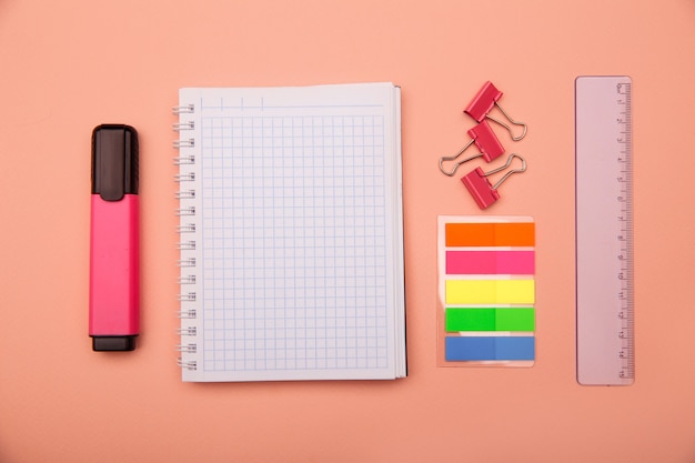 school supplies on pink.