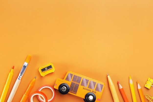 School supplies on yellow background. Concept back to school