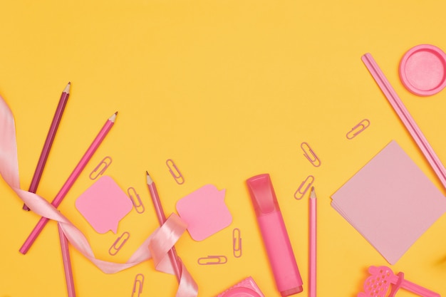 School supplies on yellow background