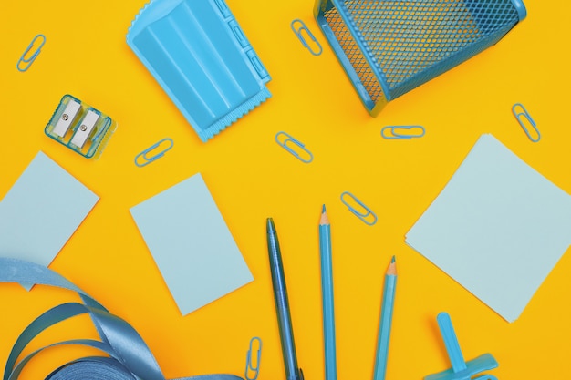 School supplies on yellow background