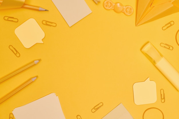 School supplies on yellow background