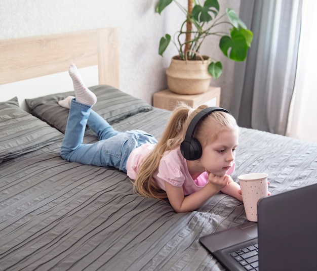 Schoolgirl studing at home