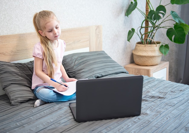 Schoolgirl studing at home