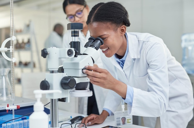 Science allows you to see a lot more Shot of a young scientist using a microscope in a lab