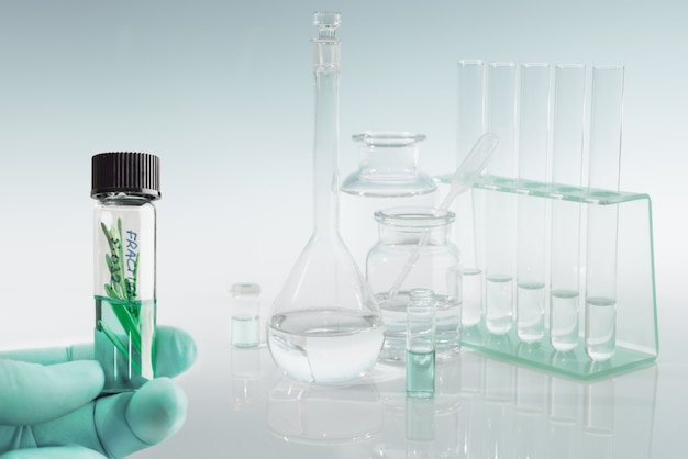 Scientific background with laboratory glassware, text space