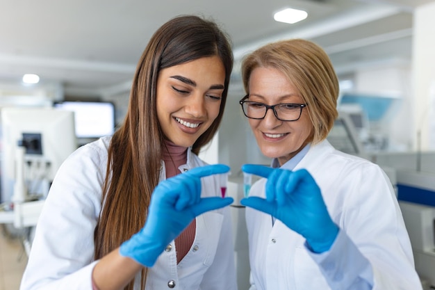 Scientist holding samples into tubes in research laboratory Advanced Scientific Lab for Medicine Biotechnology Microbiology Development