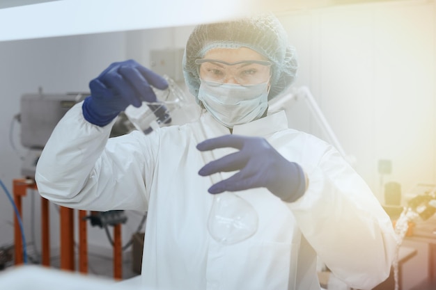 Scientist or nurse holding a test tube