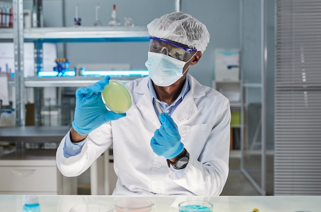 Scientist taking sample in the lab