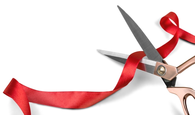 Scissors Cutting Red Ribbon