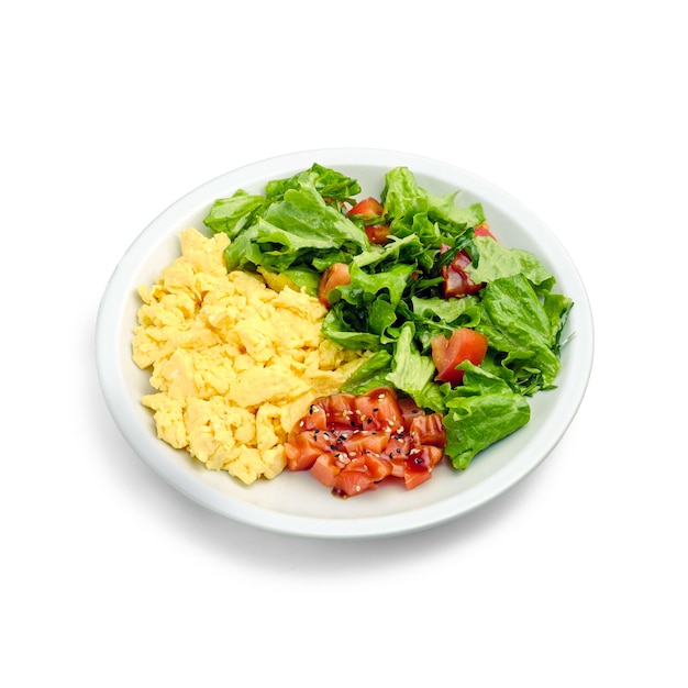 Scramble with fish and a salad of fresh vegetables and lettuce Breakfast in a cafe Isolated object on a white background