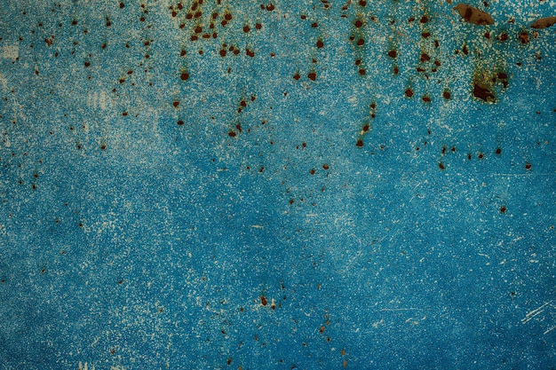 Scratched surface with paint and rust stains texture as a background