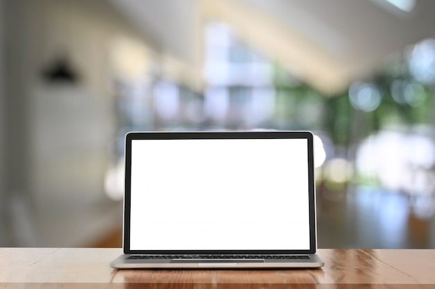 Screen computer laptop is putting on a wooden working desk