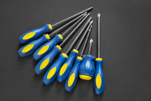 Screwdrivers on black background