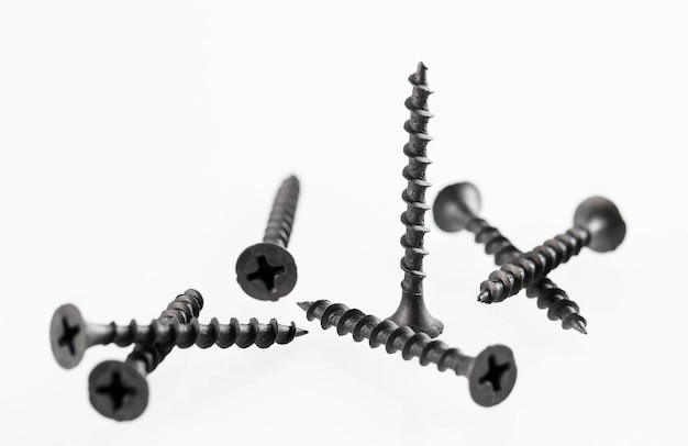 Screws still life large self tapping screws on white background.